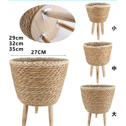 Tris di cestini portavaso con gambe in legno