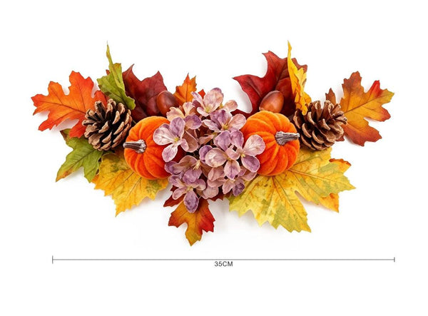 Composizione autunnale con zucche, ortensia e pigne – l 35 cm