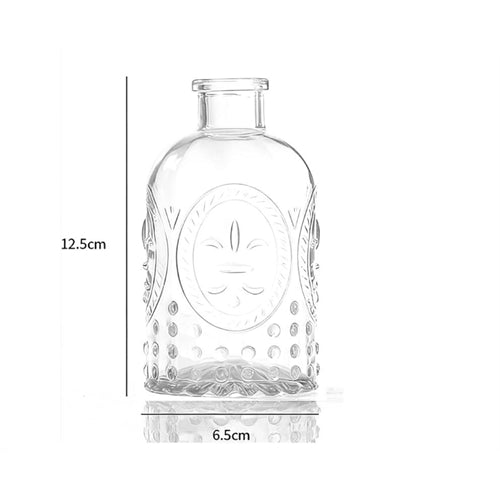 Vasetto decorativo in vetro trasparente con motivi ornamentali in rilievo – ø 6,5 × h 12,5 cm